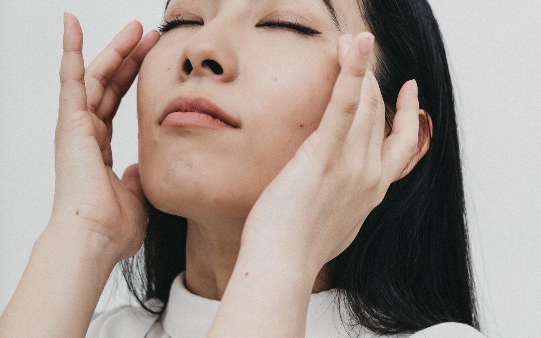 Woman massaging her temples